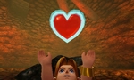 Link récupérant un réceptacle de cœur après avoir vaincu le Roi Dodongo