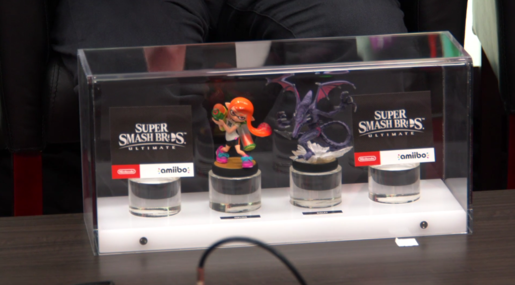 Les Amiibos Ridley et Inkling sur le stand de Nintendo à l'E3 2018